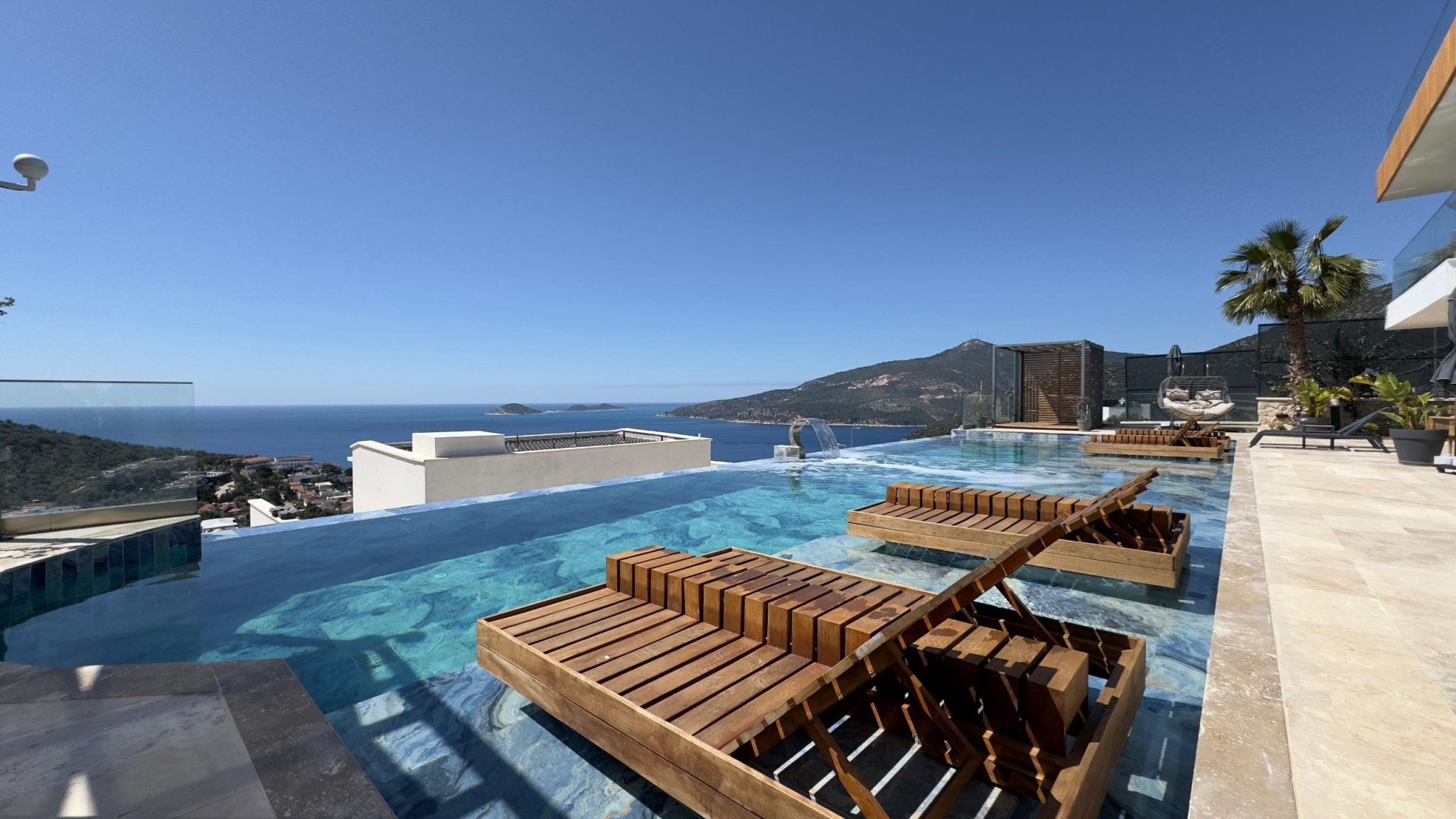 WA photo of pool with villa in front